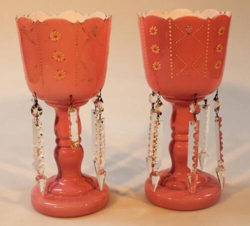 A pair of late Victorian pink glass goblet lustres