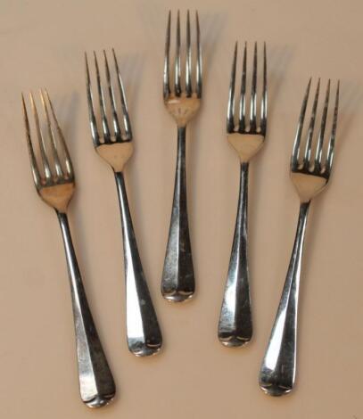 A set of five Elizabeth II silver rattail entree forks