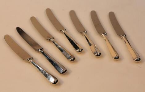 A set of seven Elizabeth II entree knives