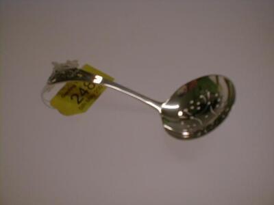 A modern silver sifter spoon