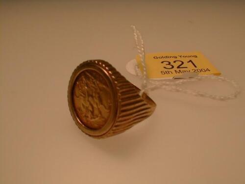 A sovereign set ring. 1926£40-50