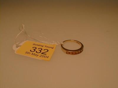 A ladies dress ring by Garrard & Co. of yellow square cut