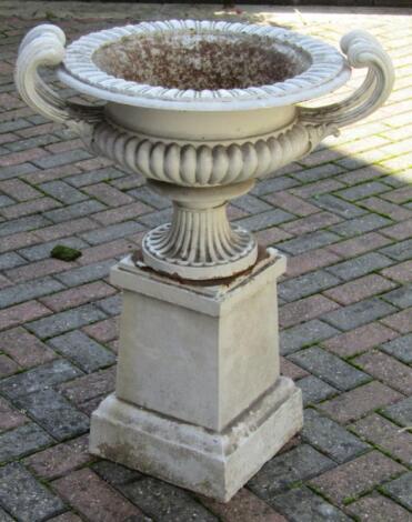 A Victorian cast iron garden urn