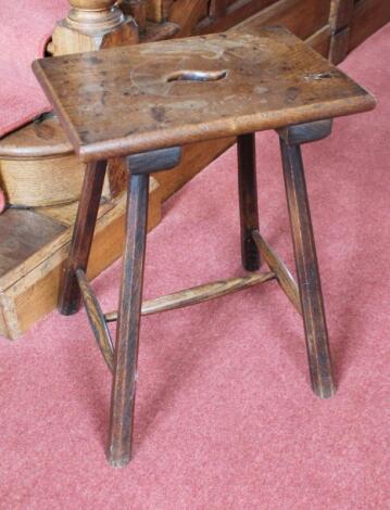 A 19thC rustic oak and elm stool