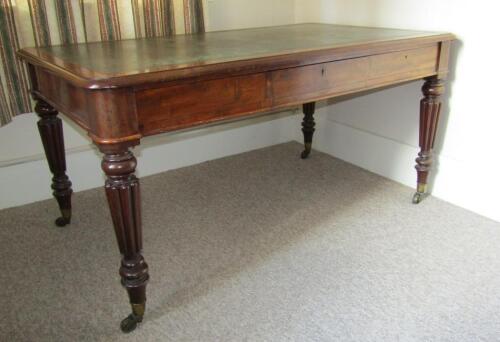 A 19thC Gillows mahogany library table