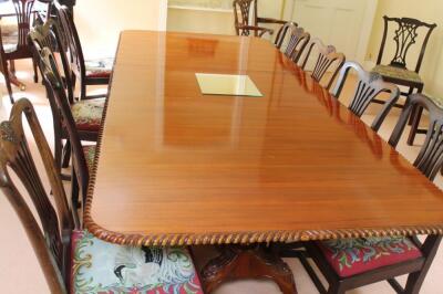 A reproduction Georgian mahogany twin pillar dining table - 2