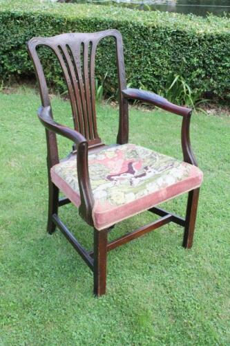 A George III carved mahogany carver chair