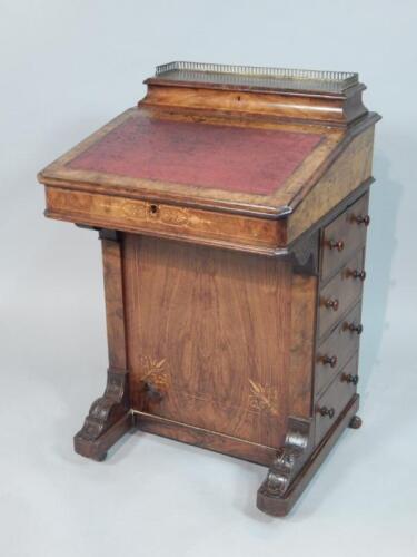 A Victorian walnut marquetry Davenport