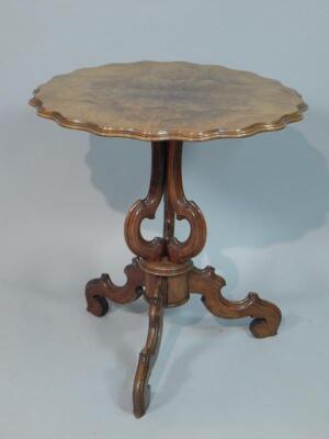 A 19thC walnut tilt top occasional table