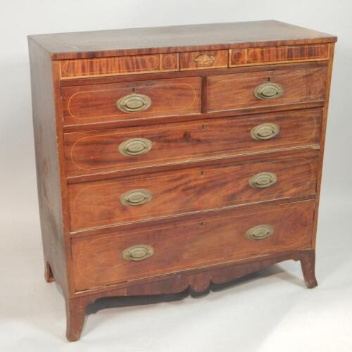 An early 19thC mahogany and boxwood strung chest of drawers