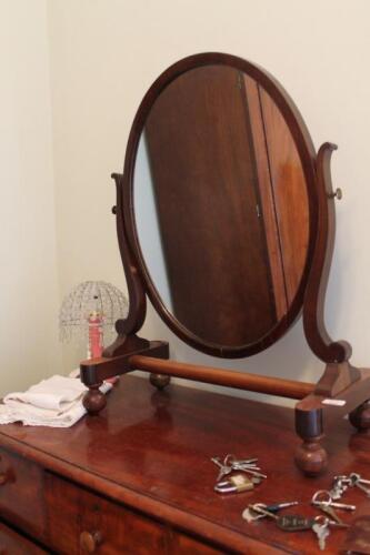 A Victorian mahogany dressing table mirror