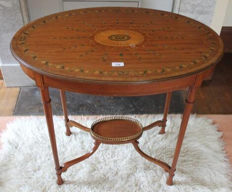 An Edwardian satinwood Sheraton revival occasional table