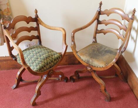 A pair of 19thC walnut Savonarola chairs