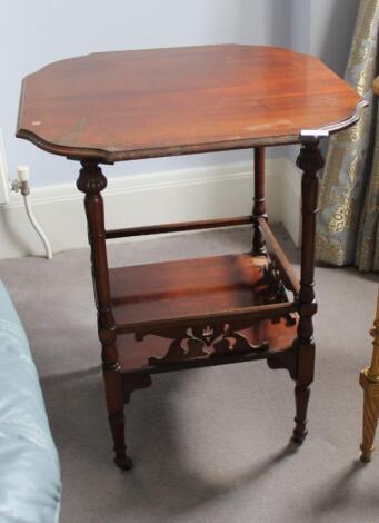 An Edwardian mahogany window table