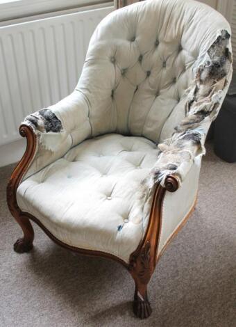 A Victorian walnut framed armchair