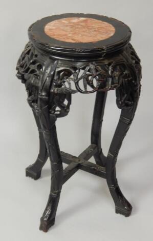 A 19thC Chinese ebonised hardwood jardiniere stand