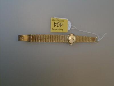 A Ladies 9ct gold Omega bracelet watch