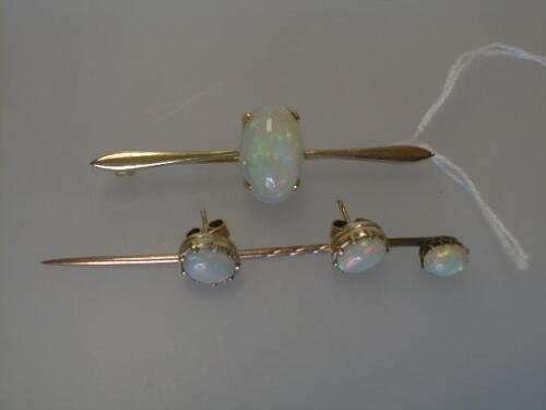 An opal set bar brooch