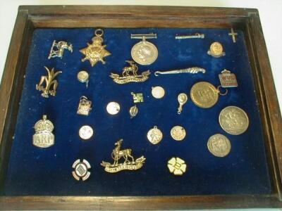 A display case of trinket items including lace hook