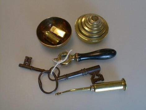 Graduated set of brass weights