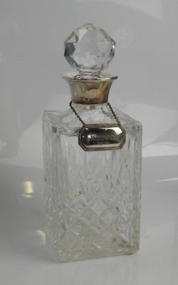 A square cut glass spirit decanter