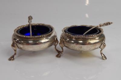 A pair of George III silver circular salts