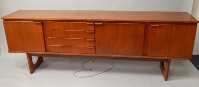 A teak Long John type sideboard