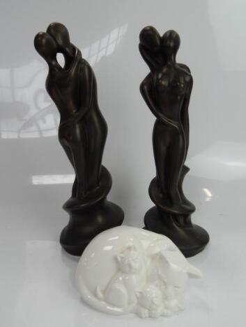 Two Heredities bronze finished modern resin figures