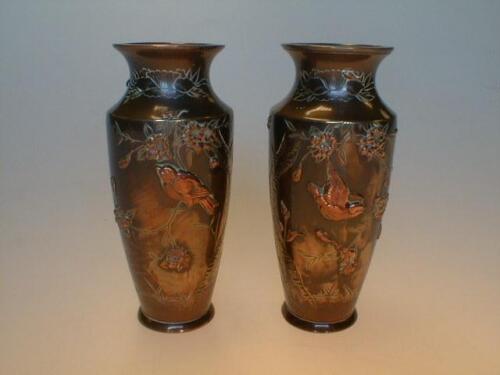 A pair of Meiji period Japanese bronze vases