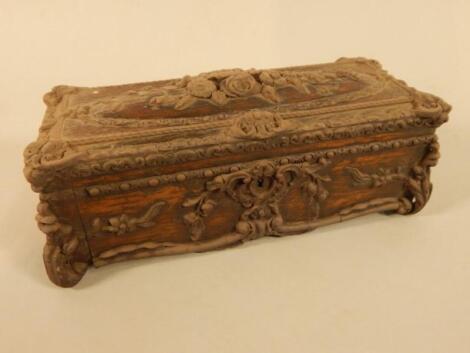 A Victorian carved rosewood glove box