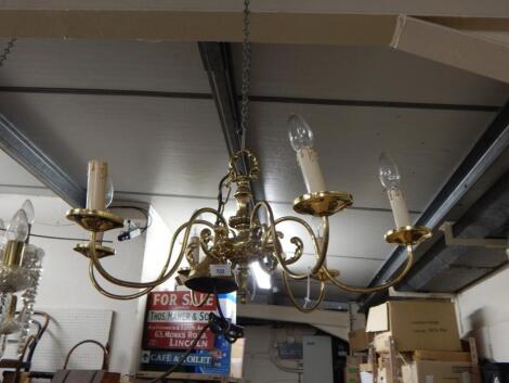 Three Dutch style brass light fittings