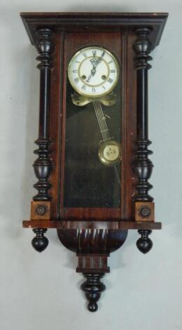 A late 19thC Vienna walnut wall clock