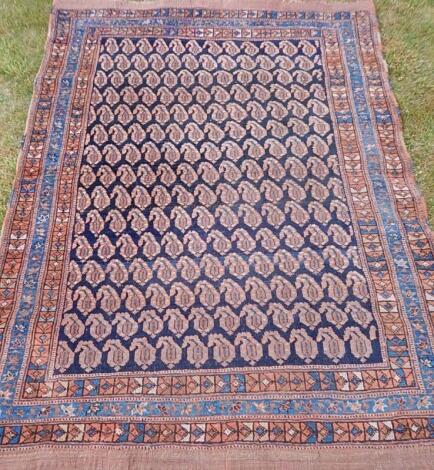 An antique Oriental rug