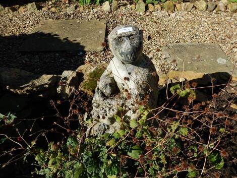 A reconstituted stone garden figure group