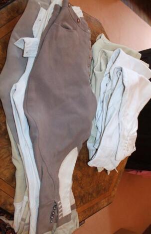 Nine pairs of jodhpurs.