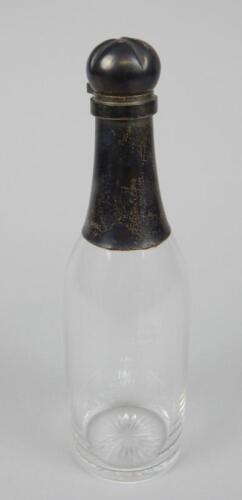 A Victorian cut glass and silver mounted decanter and stopper