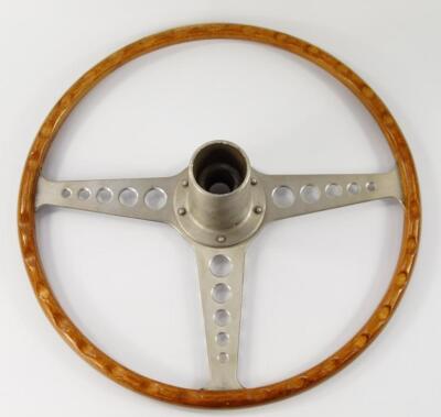 A period wooden and alloy steering wheel for an E-type Jaguar. - 2