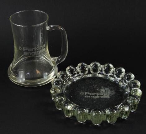 A Perkins Engines glass tankard and ashtray