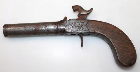 A 19thC walnut handled muff pistol