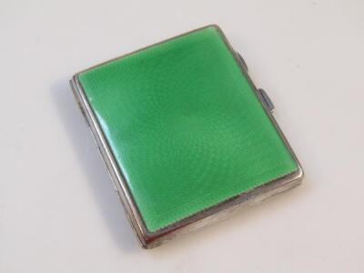 A mid-20thC green enamel and white metal cigarette case