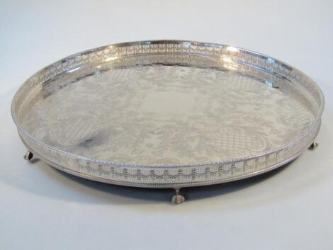 A 20thC silver plated galleried edge tea tray