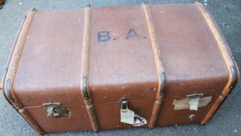 An early 20thC pressed leather travel trunk