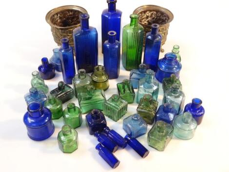 A quantity if various glass bottles