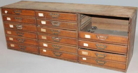 A late 19thC oak bank of drawers