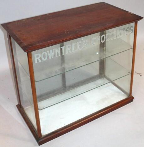 An early 20thC mahogany cased Rowntree's chocolate table confectionary cabinet