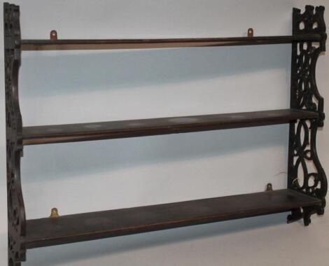 A set of 20thC Chippendale design hanging shelves