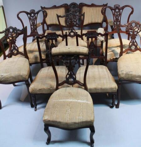 A late Victorian mahogany framed part salon suite