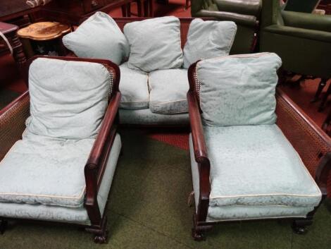 A mid-20thC mahogany framed bergere salon suite