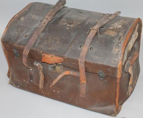 An early 20thC compressed leather bound travel trunk