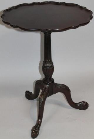 An early 20thC mahogany Chippendale revival tripod table